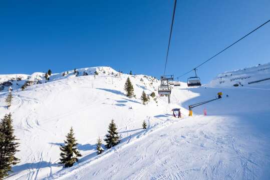 Gondola lift on the snowy slopes of the Brenta Dolomites - Alps