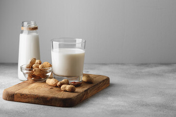 Vegan peanut milk in glass with peanuts