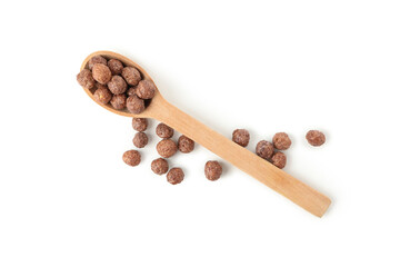 Spoon with corn balls isolated on white background