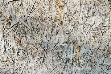 An old board pressed from sawdust. Background. Graphic resources.