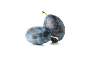 Fresh blue plums isolated on white background