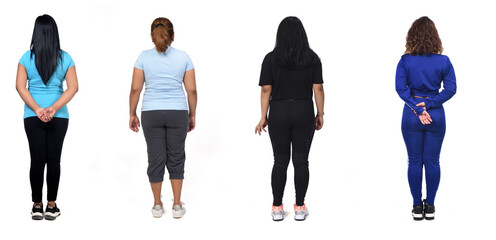 back view of a group of Latin American women with sportswear on white background