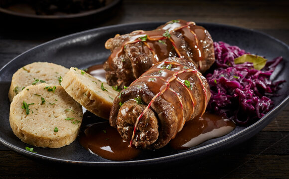 Serving of traditional beef roulade in gravy