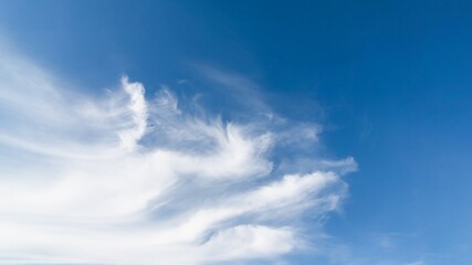 Scenic sky panorama background. White cirrocumulus clouds like a wave in the blue sky - obrazy, fototapety, plakaty