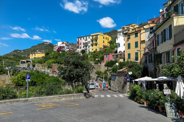 Fototapeta na wymiar Commune of Riomaggiore, Liguria, Province of Spezia, Italy - September 7, 2016 - Centennial village by the sea that belongs to the Cinque Terre complex