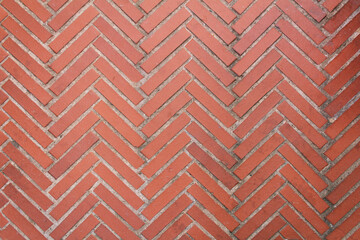 Ceramic geometrical red tile background. Street road.