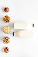 Above view of non-dairy milk alternative - almond hazelnut walnut oat milk