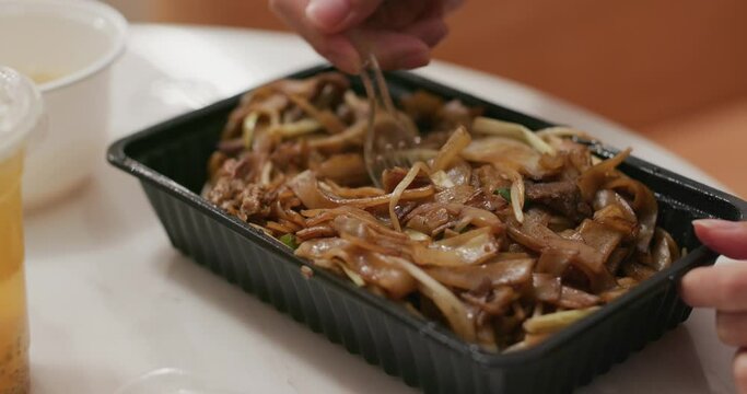 Fried soy sauce noodle take away and eat at home, Hong Kong local food