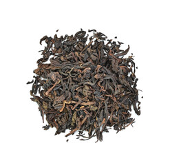 Dry green tea leaf isolated on white