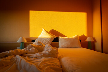 comfortable and cosy bedroom with a messy unmade bed