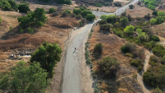 Bicyclist Riding on the Trail