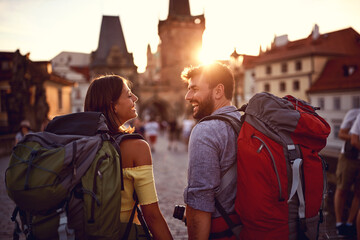 Young tourist couple and love on a city streets