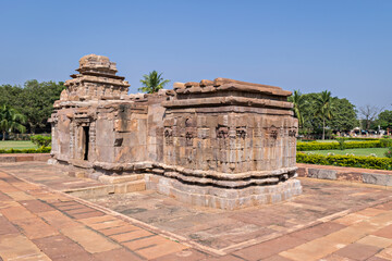 Ancient 8th century carved stone temple with beautiful blue sky at Aihole,India.