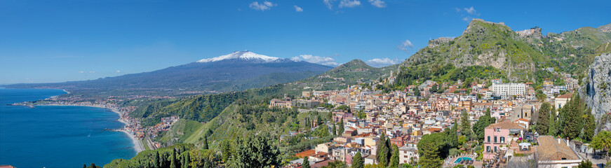 Fototapeta na wymiar Taormina and Mt. Etna volcano in the bacground - Sicily.