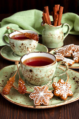 Still life with tea mugs and  gingerbread cookies