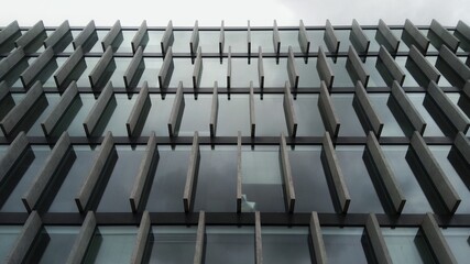 Black and white modern office building glass and concrete wall