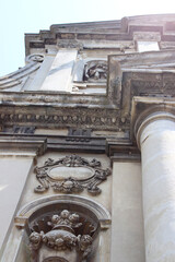 Architectural elements of a church building. Baroque style. White stone. Looking up