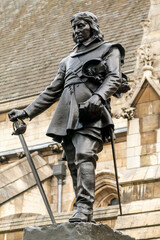 Oliver Cromwell memorial statue the Houses of Parliament London England UK unveiled in 1899 Lord Protector of the republic after the English Civil War which is a popular travel destination