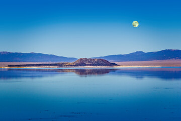 Paoha island under a full moon in the mono lake, California