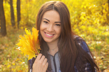 young woman in autumn park