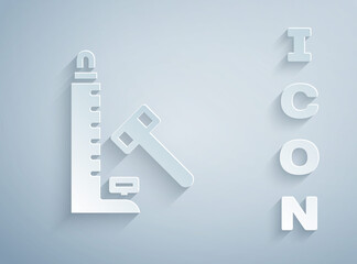 Paper cut High striker attraction with big hammer icon isolated on grey background. Attraction for measuring strength. Amusement park. Paper art style. Vector.