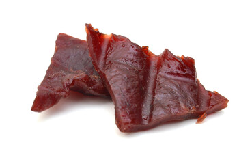 Beef jerky pieces on white