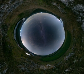 Little planet 360 degrees panorama with a stars and Milky Way in the background. Outdoors, nature...