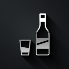 Silver Bottle of vodka with glass icon isolated on black background. Long shadow style. Vector.