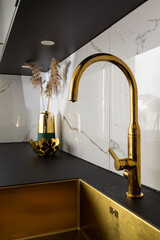 Interior home styling classic and modern kitchen golden water tap