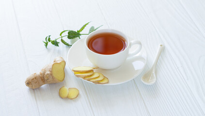 Healthy ayurvedic tea with ginger and mint leaves