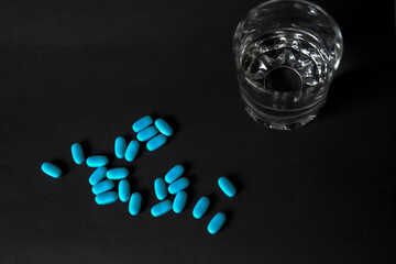 
Tablets with a glass of water