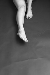 Details of body of beautiful girl, fashion and art, authentic black and white photo shoot