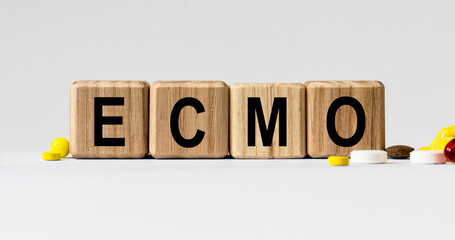 cubes with the word ECMO on them. Care concept.