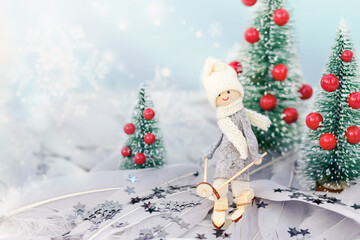 christmas toy skier in winter background