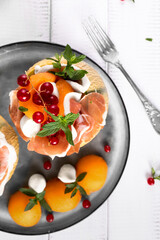 Prosciutto mozzarella cheese melon