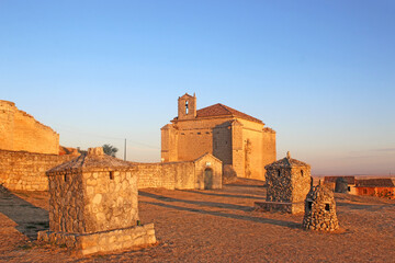 Ampudia Castle and chapel, Spain in morning light