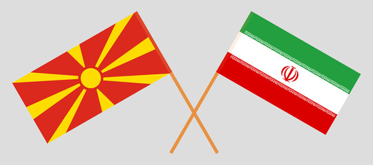 Obraz premium Crossed flags of North Macedonia and Iran