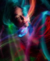 Fototapeta na wymiar lightpainting portrait, new art direction, long exposure photo without photoshop, light drawing at long exposure 