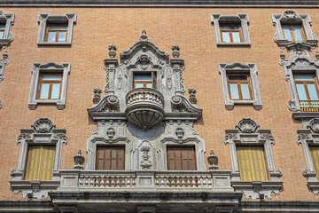 Building facade: Architectural fragments of ancient buildings in Valencia, Spain.
