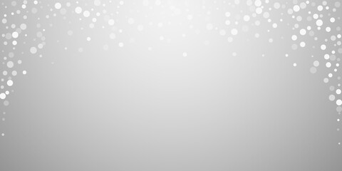 White dots Christmas background. Subtle flying sno