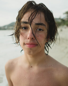 Portrait of a teenage boy at the beach