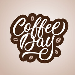 Coffee day - modern calligraphy style design. Vector inscription with coffee beans.