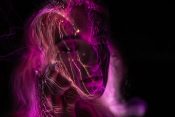 Obraz premium lightpainting portrait, new art direction, long exposure photo without photoshop, light drawing at long exposure