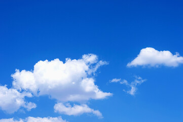 Naklejka na ściany i meble Summer blue sky with clouds as a design element or beautiful background