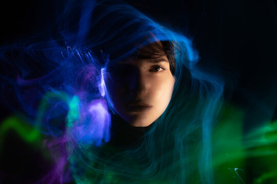 lightpainting portrait, new art direction, long exposure photo without photoshop, light drawing at long exposure