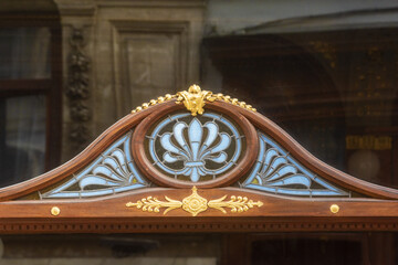 detail of an art deco facade of a brewery in Brussels, Belgium