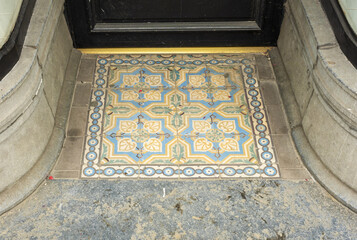 mosaic at the entrance of an old butcher's shop in Brussels, Belgium