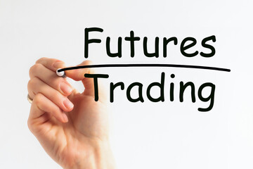 Hand writing inscription FUTURES TRADING with marker, concept, the letters in black, financial and trading concept