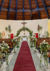 church interior decorated with flowers for a wedding
