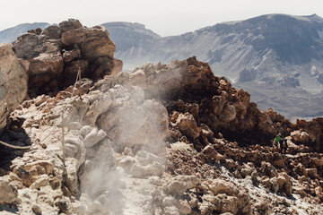 Teide National Park. Beautiful view of volcano. Desert area of a volcanic crater with rocks and mountains. Mount in Tenerife. Canary Islands
